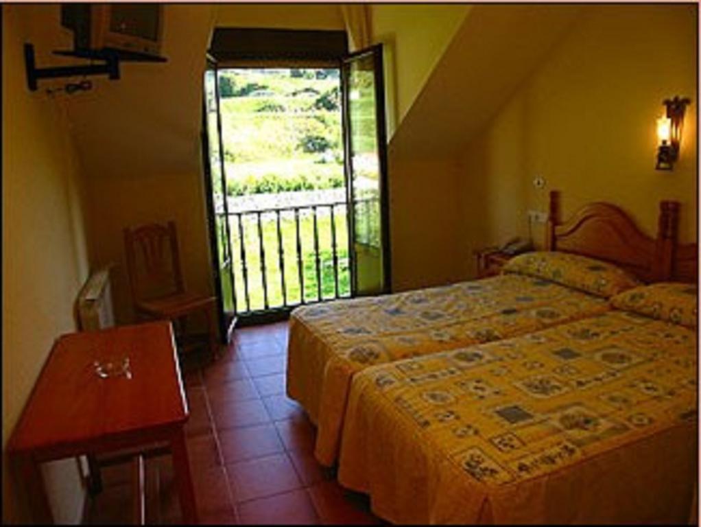 Hospederia El Cantio Orena Zimmer foto